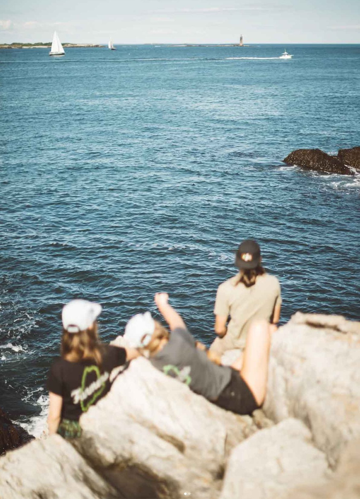 Adults outdoors on the Maine coast